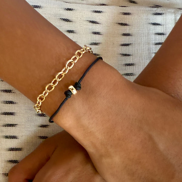 black cord bracelet