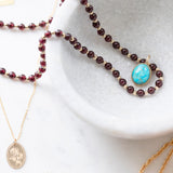 Garnet and gold bead necklace
