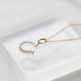 Diamond Horseshoe Charm by Becket & Quill, handmade in Los Angeles - detail view