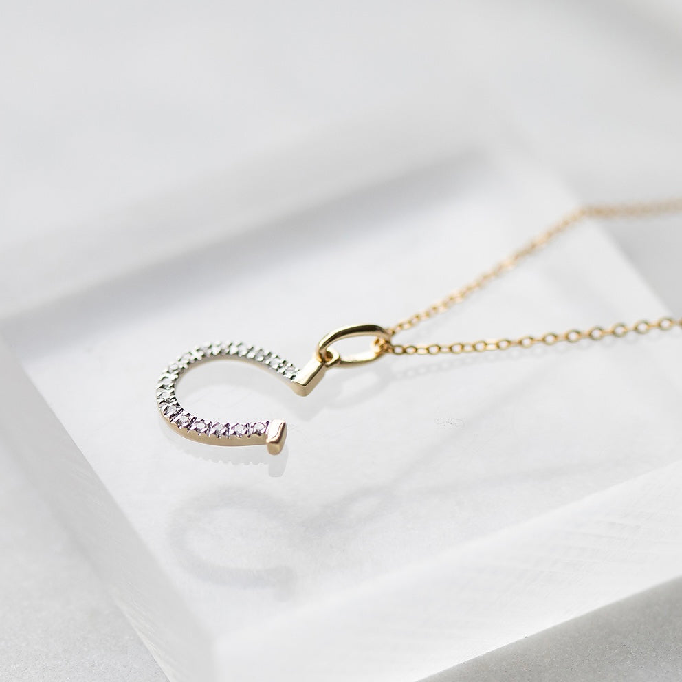 Diamond Horseshoe Charm by Becket & Quill, handmade in Los Angeles - detail view