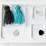 Turquoise tassel charm
