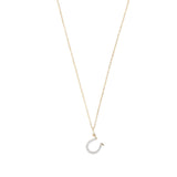 Diamond Horseshoe Charm by Becket & Quill, handmade in Los Angeles - worn close-up