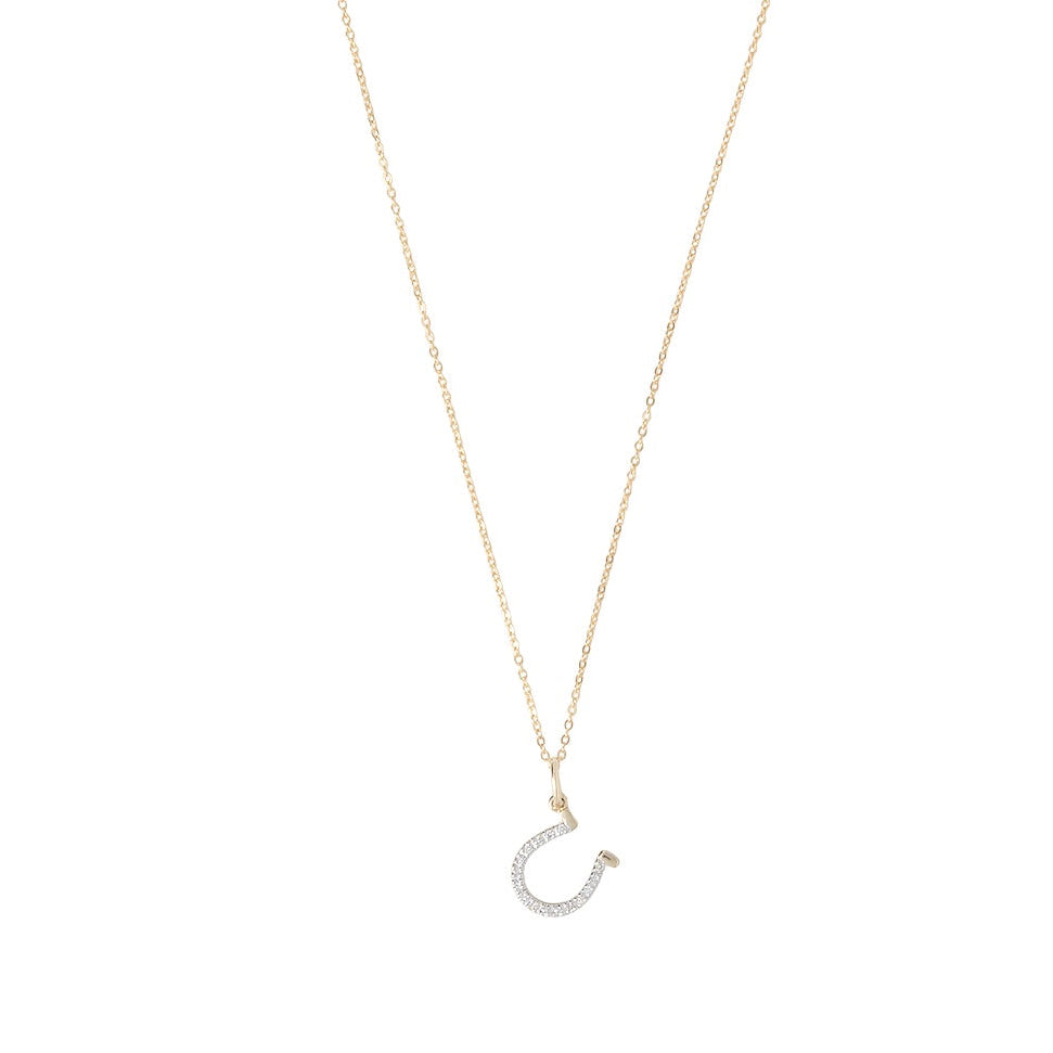 Diamond Horseshoe Charm by Becket & Quill, handmade in Los Angeles - worn close-up