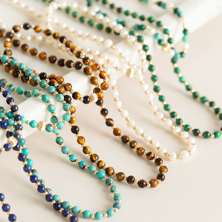 Tiger's Eye And Gold Bead Necklace by Becket & Quill, handmade in Los Angeles - worn close-up
