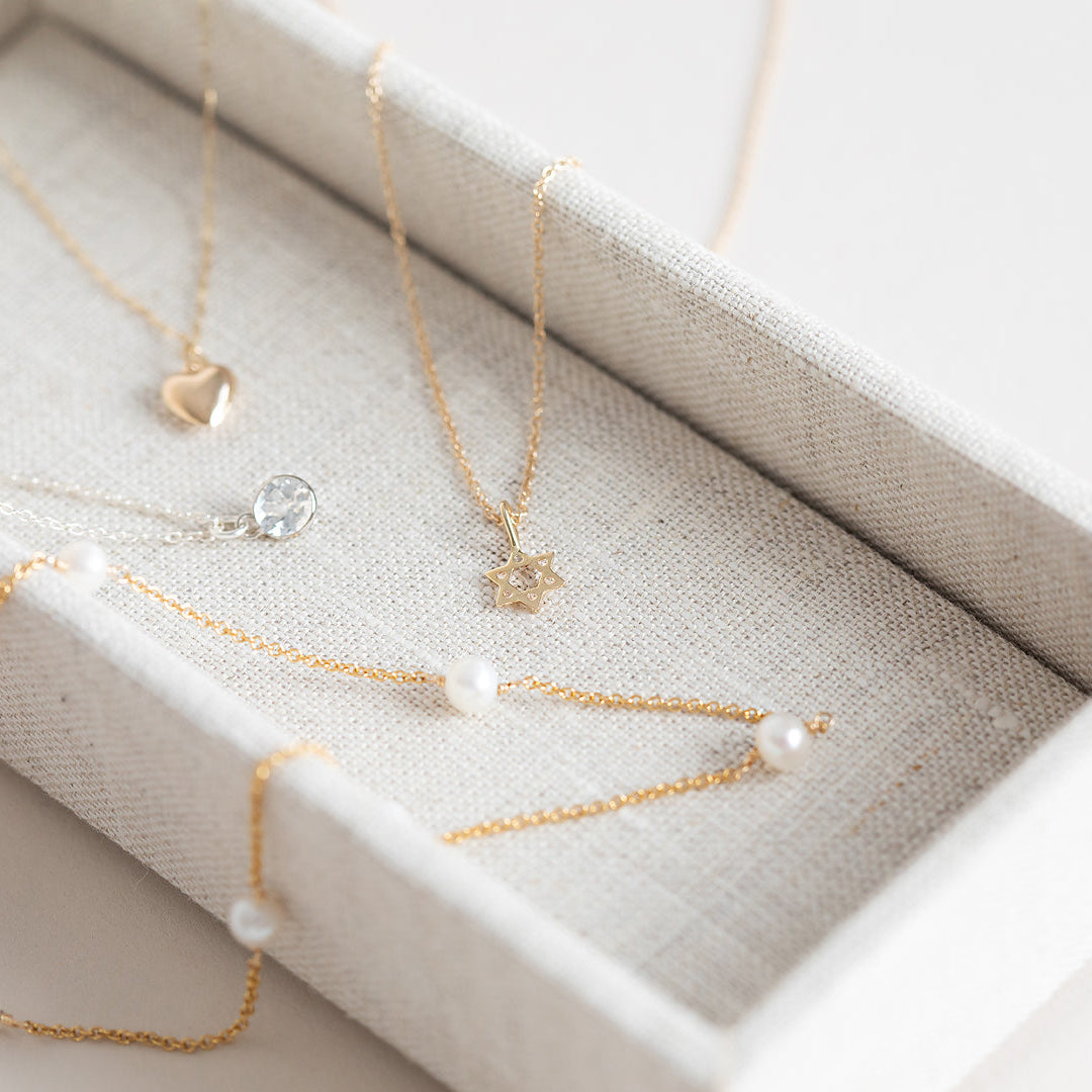 Star Of David Necklace by Becket & Quill, handmade in Los Angeles - worn close-up