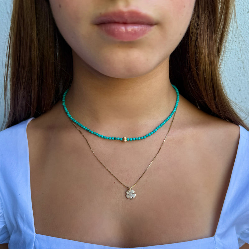 Petite Turquoise and corrugated bead Necklace
