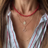 Coral and gold beaded necklace