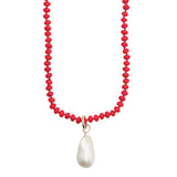 Long Coral Beaded Necklace by Becket & Quill, handmade in Los Angeles - styled on model