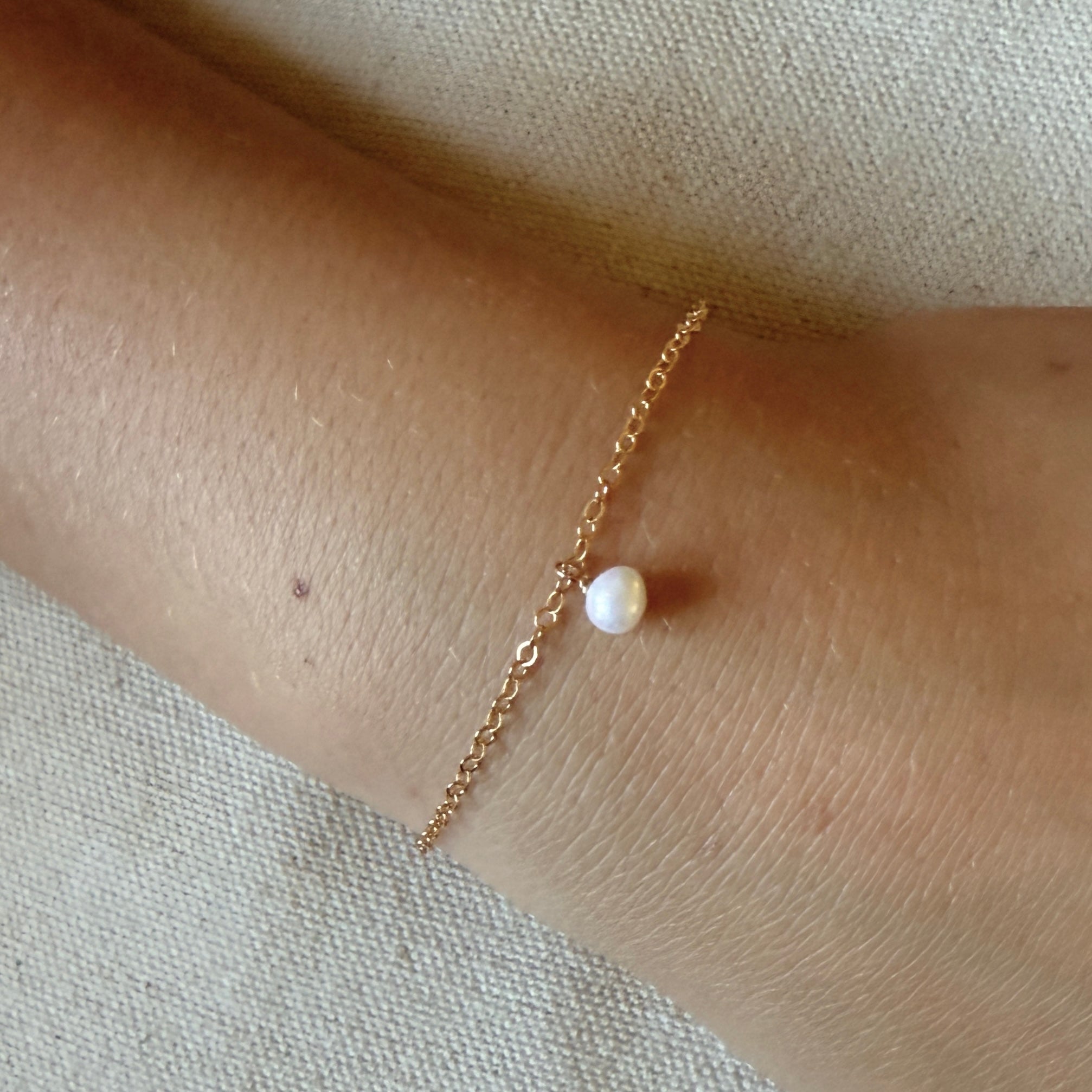 Pearl Charm Bracelet by Becket & Quill, handmade in Los Angeles - detail view