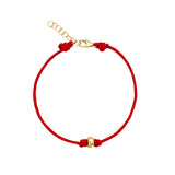 red cord bracelet