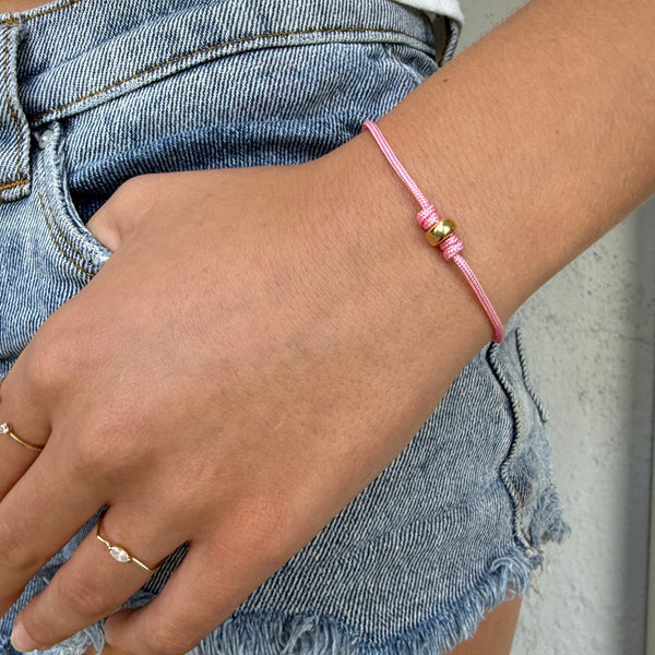 Pink cord bracelet
