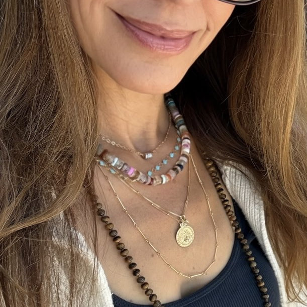 layered with multiple necklaces gold st christopher necklace tigers eye bead necklace bar chain layering necklace