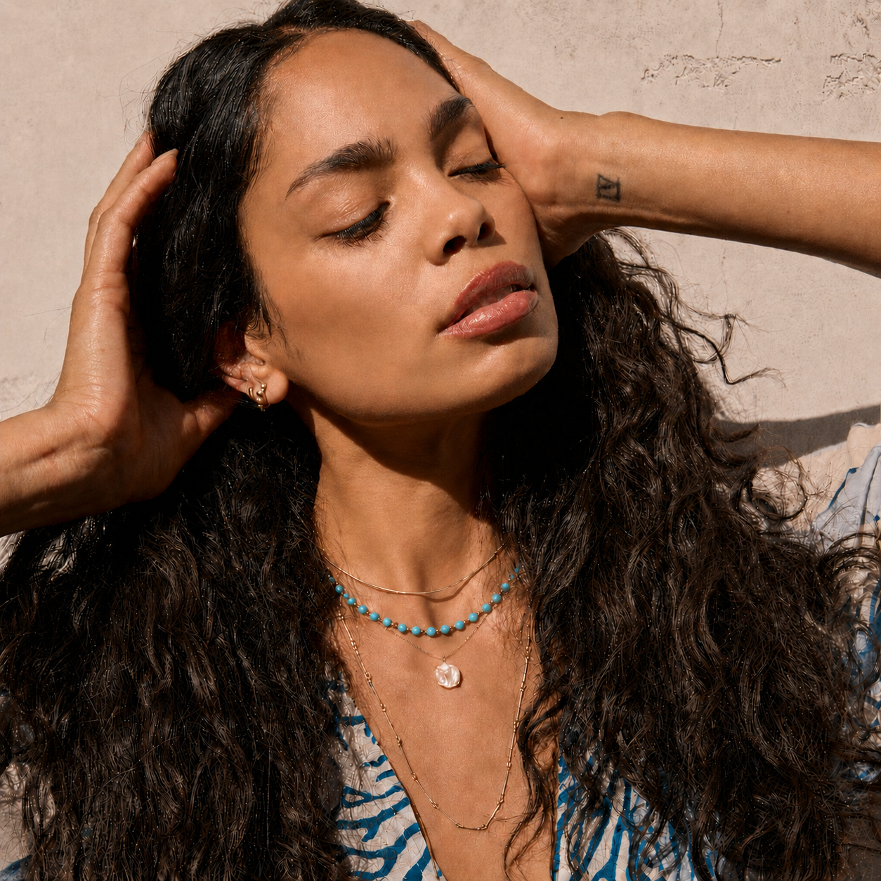 layered necklaces including turqouise beaded necklace, freshwater pearl charm hecklace, gold filled choker and hoop earrings