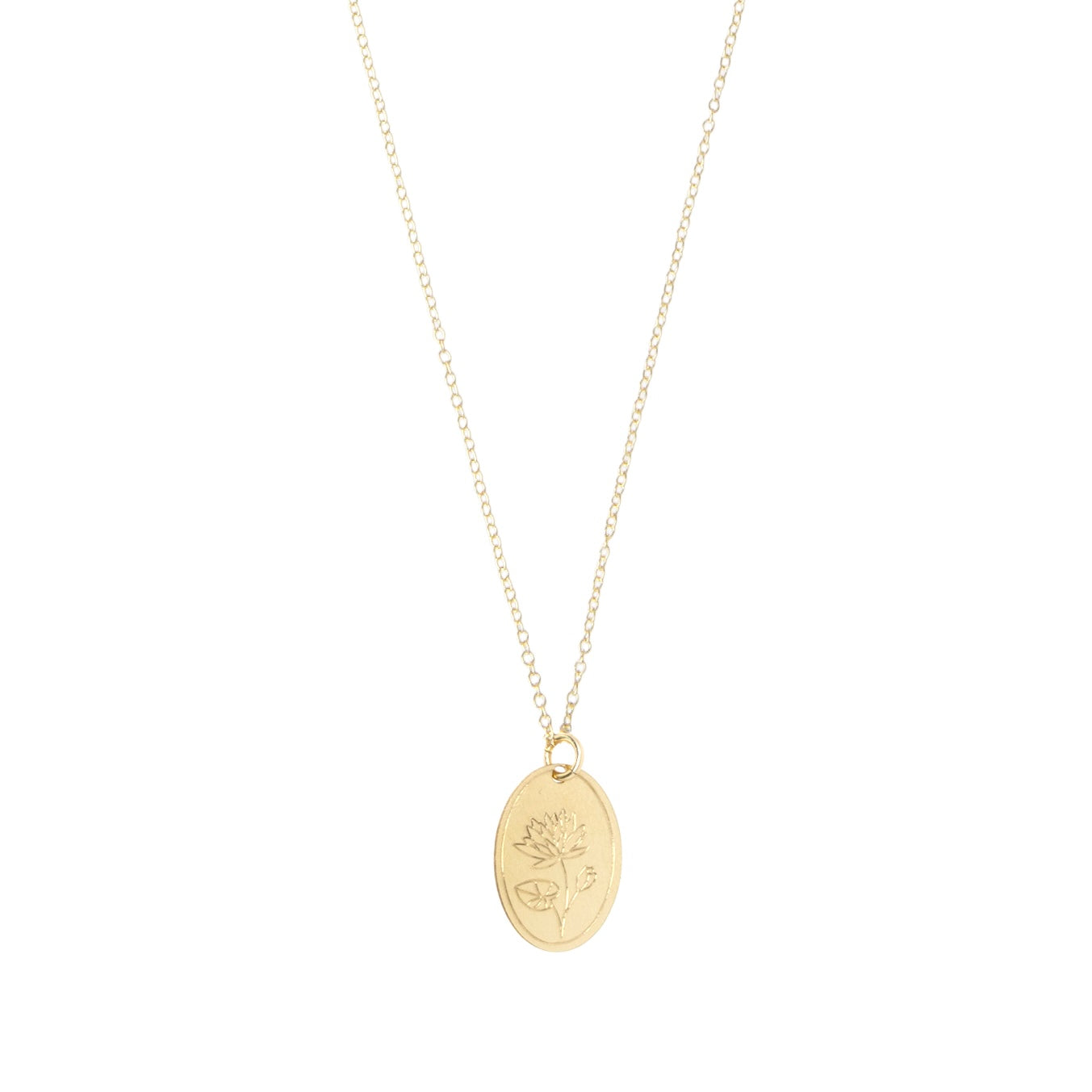 Gold necklace with a pendant that has a delicate engraved flower