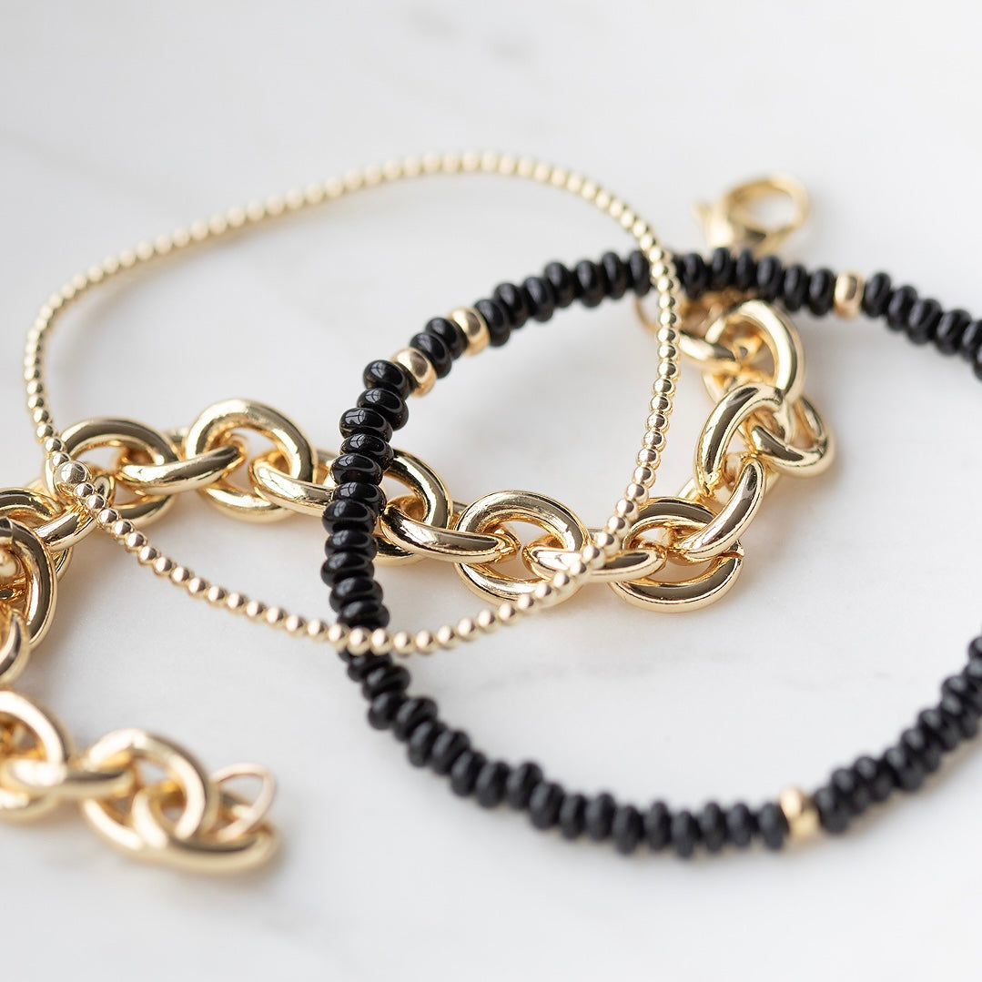 Gold filled bead and link chain and black agate beaded bracelets 