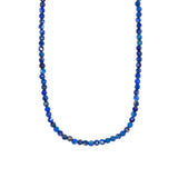 A mini beaded necklace made of faceted blue lapis lazuli stones