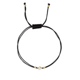 Black macrame cord bracelet with a small round CZ charm 