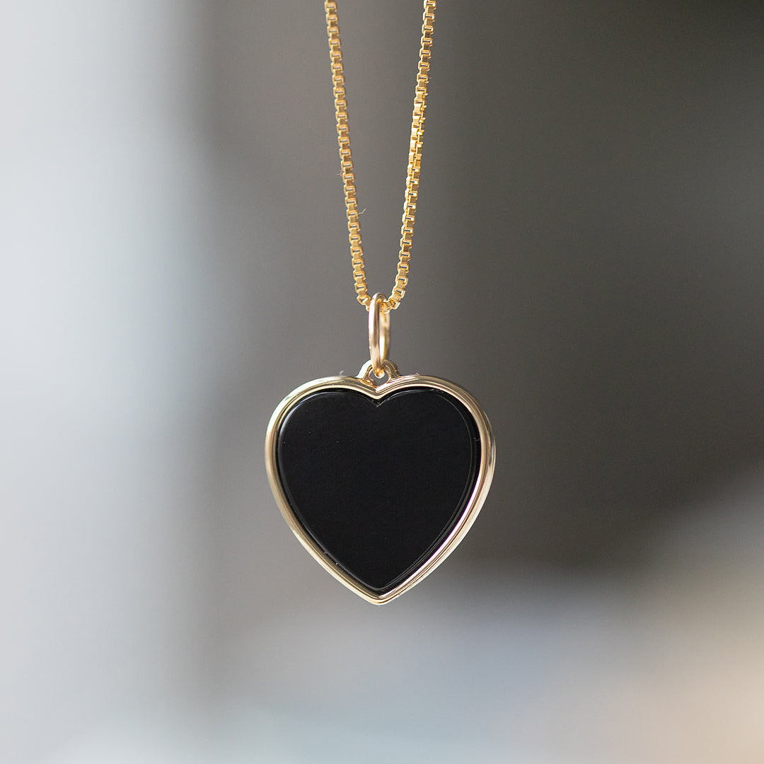 Onyx Heart Charm by Becket & Quill, handmade in Los Angeles - detail view