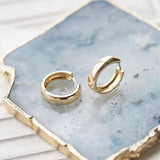 Midsize think width gold filled Hoops hoop earrings by Becket & Quill, handmade in Los Angeles - worn close-up