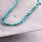 Long Turquoise Beaded Necklace by Becket & Quill, handmade in Los Angeles - worn close-up